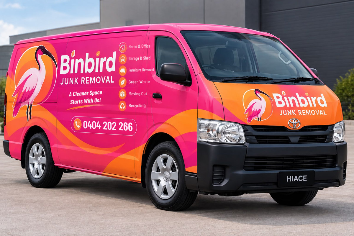The pink and orange BinBird junk removal van